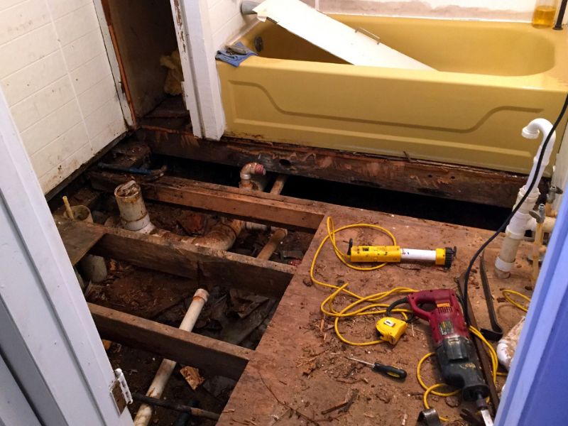 Bathroom floor repair after water damage in Orlando FL home restoration project