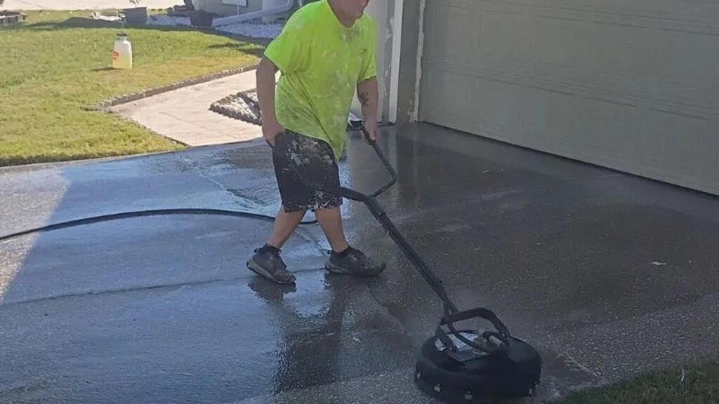 Concrete driveway in Orlando half pressure washed